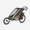 Thule Chariot Cross vienvietīgā velosipēdu piekabe bērniem krāsa Khaki